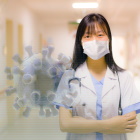 Pflegerin mit einem überlagerten Bild eines Viruses
