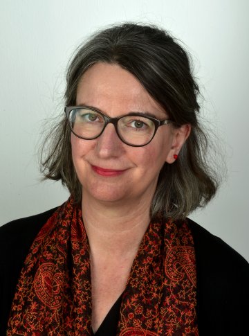 Porträtbild von Michaela Evans, Direktorin des Forschungsschwerpunktes Arbeit & Wandel.