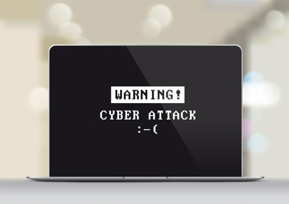 cybersecurity Bild eines Laptops mit einer Warnung zur Cyber Security